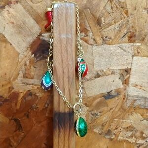 Joan Rivers Christmas egg bracelet with 4 charms